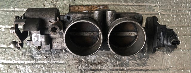 Дросільна заслінка в зборі 90411873 GM