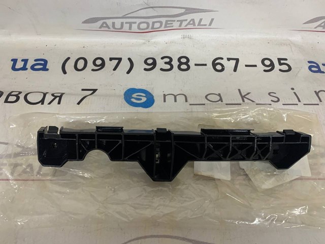 Кронштейн бампера переднього, зовнішній лівий 521460E010 TOYOTA