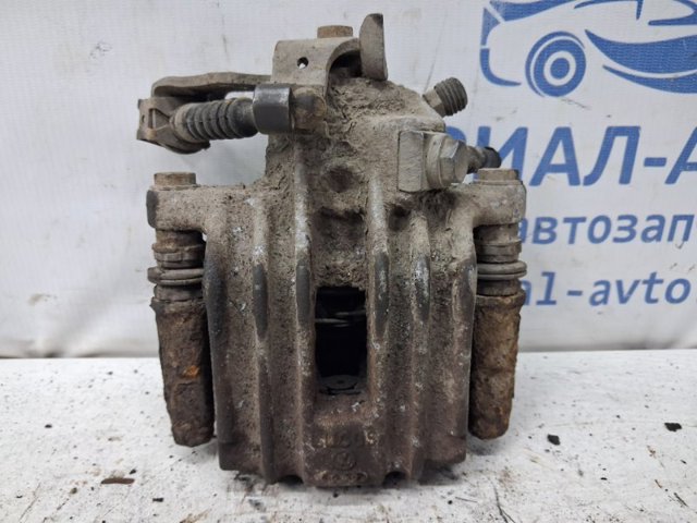 Супорт гальмівний задній правий 1J0615424H VAG