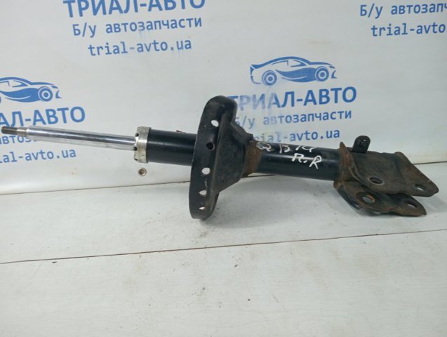 Амортизатор передньої підвіски 20310AJ080 SUBARU