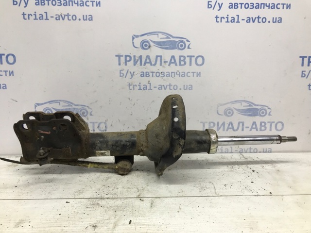 Амортизатор передньої підвіски 20310AL040 SUBARU