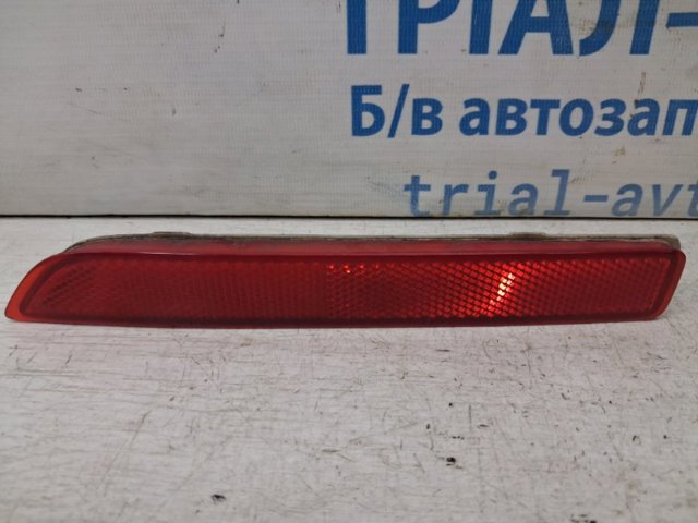 Правий відбивач бампера 265608990B NISSAN
