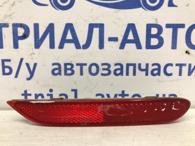 Відбивач бампера заднього правий 26560JJ90A NISSAN