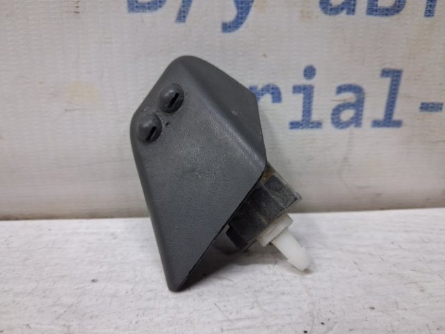 Форсунка омивача фари передньої, лівою 28642EB300 NISSAN