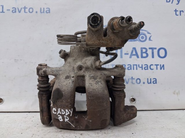 Супорт гальмівний задній правий 2K0615424 VAG