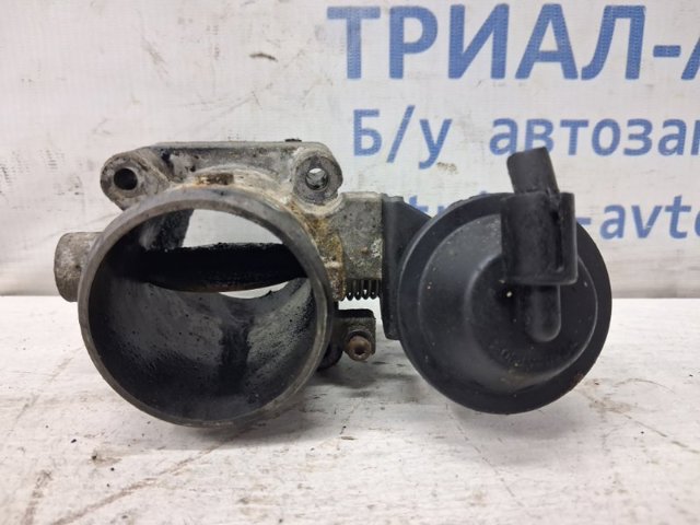 Дросільна заслінка в зборі 351002A700 HYUNDAI