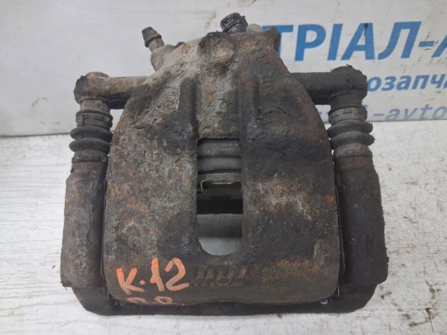 Супорт гальмівний, передній, правий 41001AX601 NISSAN