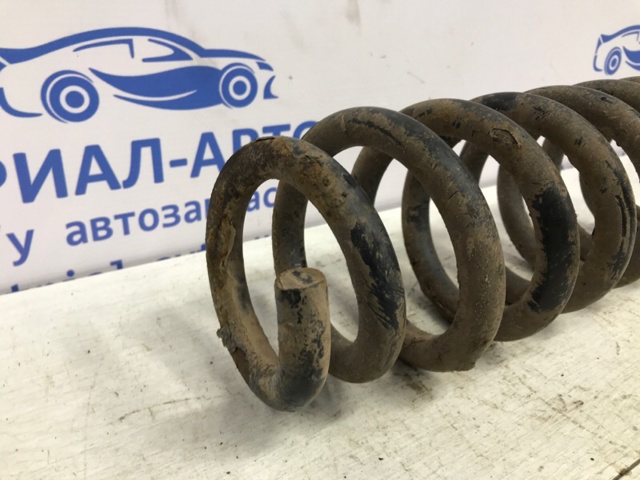 Пружина підвіски задня 4131165J00 SUZUKI