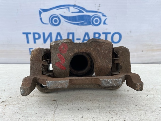 Супорт гальмівний задній правий 440011AA0A NISSAN