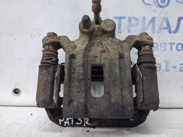 Супорт гальмівний задній правий 44001EB30A NISSAN
