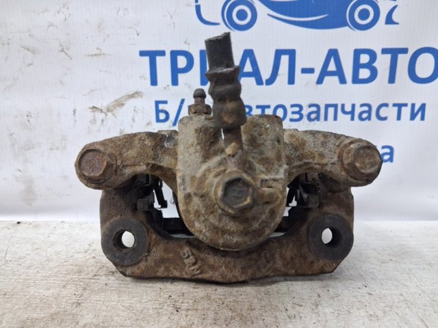 Задній гальмівний супорт лівий 44011EB30A NISSAN
