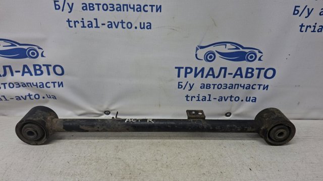 Важіль/тяга задньої підвіски подовжній нижній, правий 4550209000 SSANG YONG