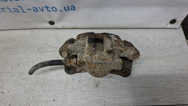 Супорт гальмівний задній правий 4605A264 MITSUBISHI