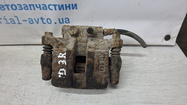 Супорт гальмівний задній правий 4605A264 MITSUBISHI