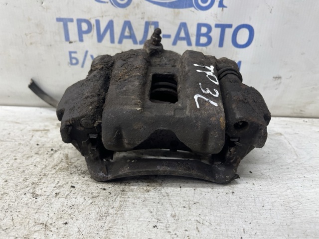 Задній гальмівний супорт лівий 4775034030 TOYOTA