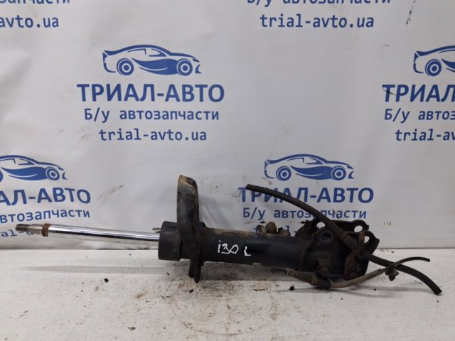 Амортизатор передньої підвіски, лівий 546512L200 HYUNDAI