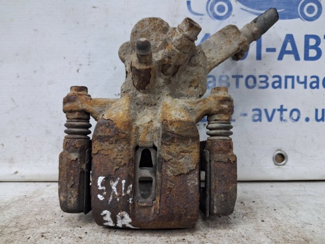 Супорт гальмівний задній правий 5540180J00999 SUZUKI
