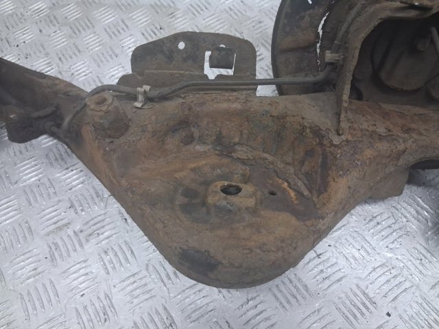 Важіль/тяга задньої підвіски подовжній нижній, правий 55501JD00A NISSAN
