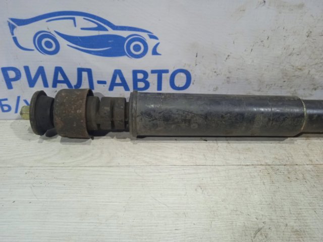 Амортизатор задній 56200AX602 NISSAN