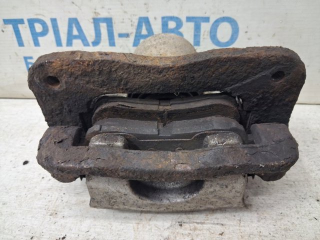Задній гальмівний супорт лівий 582102B700 HYUNDAI