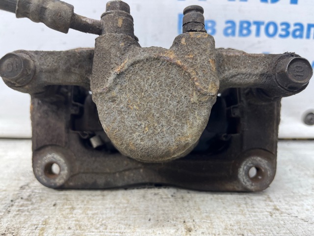 Задній гальмівний супорт лівий 582102P700 HYUNDAI