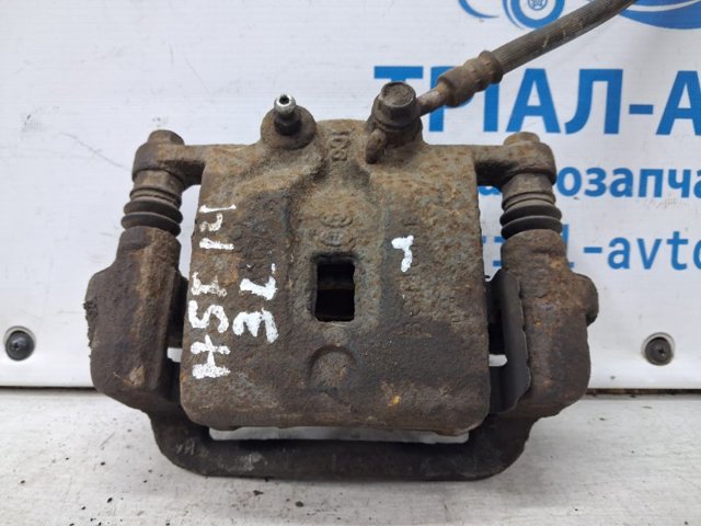 Задній гальмівний супорт лівий 582102W700 HYUNDAI