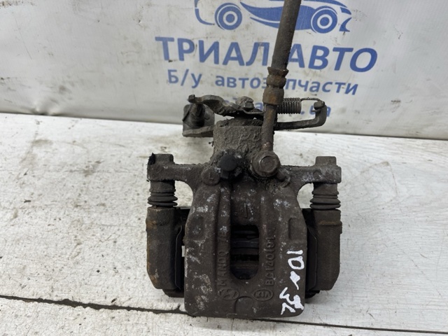 Задній гальмівний супорт лівий 58210G2400 HYUNDAI