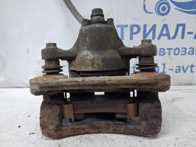 Супорт гальмівний задній правий 582301H300 HYUNDAI
