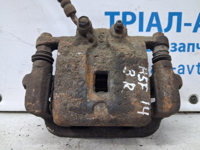 Супорт гальмівний задній правий 582302W700 HYUNDAI