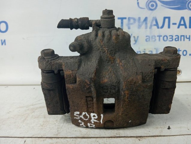 Супорт гальмівний задній правий 582303E000 HYUNDAI