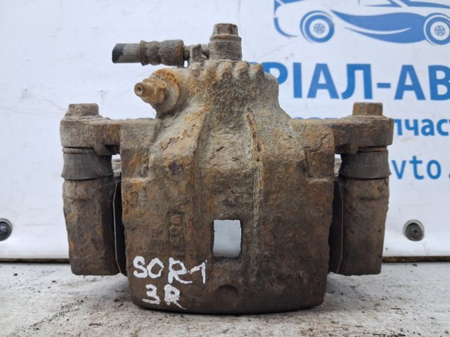 Супорт гальмівний задній правий 582303E600 HYUNDAI