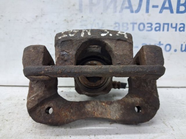 Супорт гальмівний задній правий 582303K050 HYUNDAI