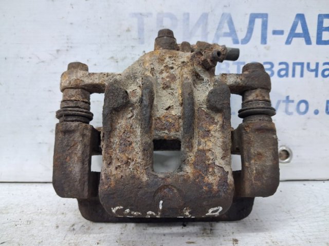 Супорт гальмівний задній правий 582303K050 HYUNDAI