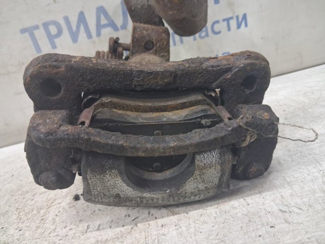 Задній гальмівний супорт лівий 5831007320 HYUNDAI