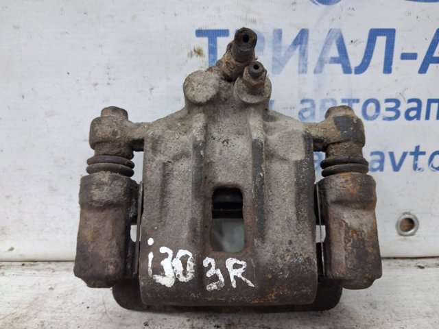 Супорт гальмівний задній правий 583111HA00 HYUNDAI