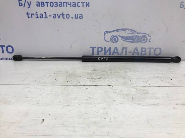 Амортизатор двері багажника 63260AL040 SUBARU