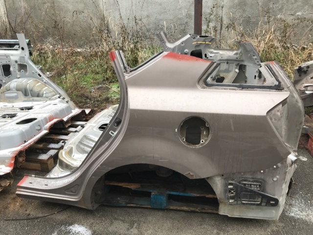 Крило заднє 701001HA50 HYUNDAI