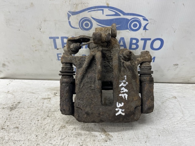 Супорт гальмівний задній правий 7701056165 RENAULT