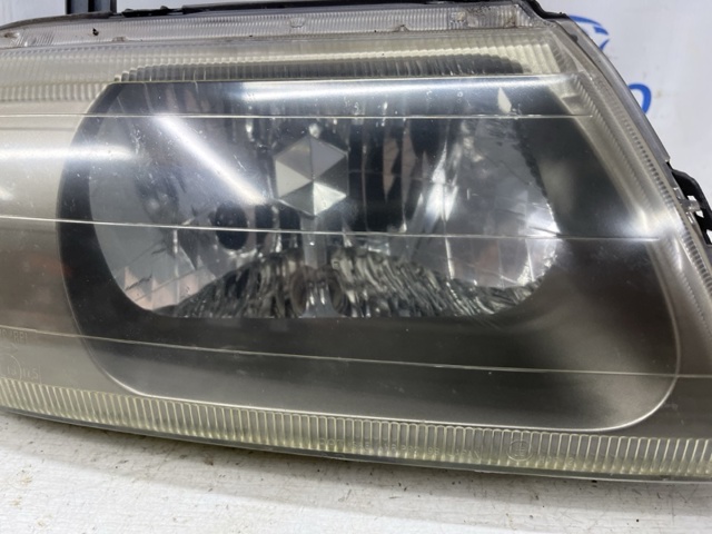 Скло фари правої 8301A366 MITSUBISHI