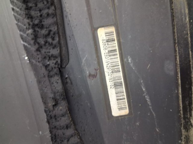 Скло багажного відсіку, праве 83306EB315 NISSAN