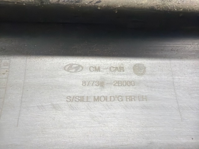 Накладка зовнішня (молдинг) порога, лівий 877302B000 HYUNDAI