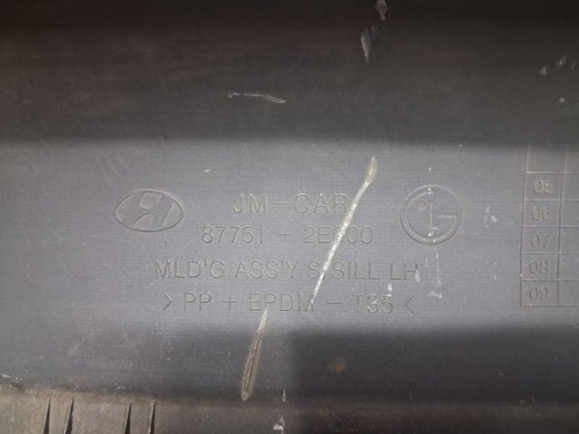 Накладка зовнішня (молдинг) порога, лівий 877512E000 HYUNDAI