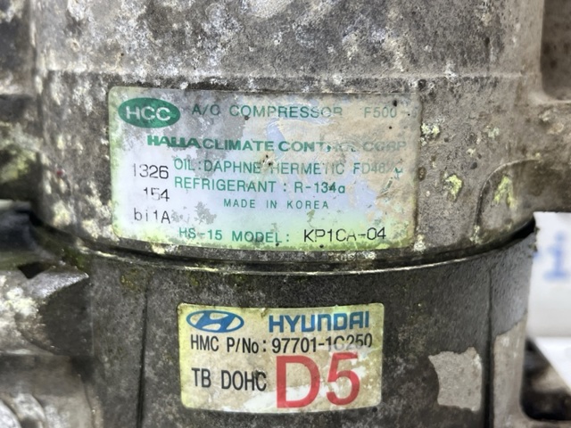 Компресор системи кондиціювання 977011C250 HYUNDAI
