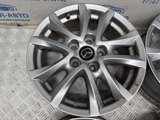Диски колісні литі (легкосплавні, титанові) 9965D06560 MAZDA