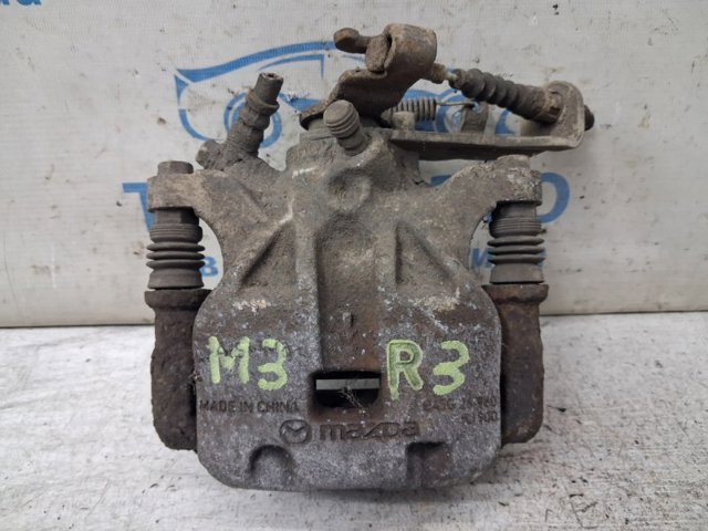 Супорт гальмівний задній правий B4Y72698ZD MAZDA