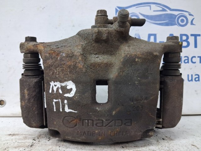 Супорт гальмівний, передній, лівий B4Y73399ZB MAZDA