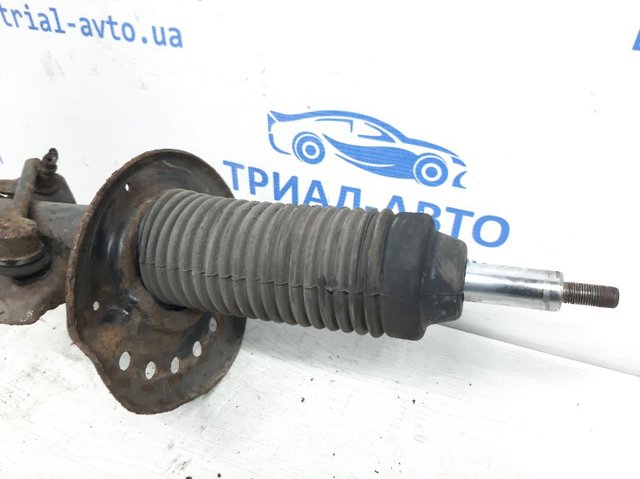 Амортизатор передньої підвіски E43021KC2A NISSAN