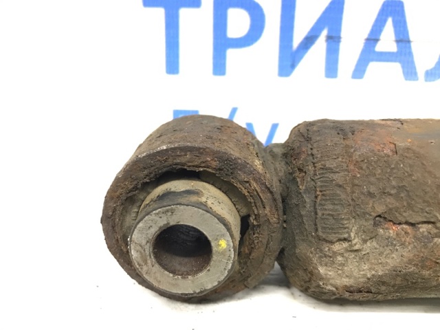 Амортизатор задньої підвіски E6210JD03A NISSAN