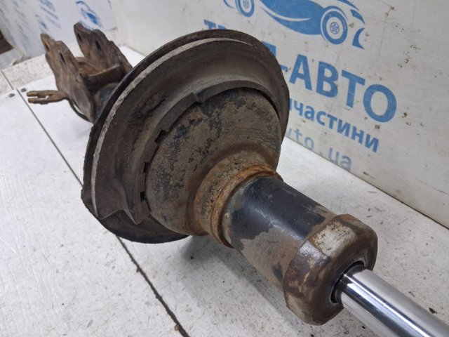 Стійка передня права EG2134700B MAZDA