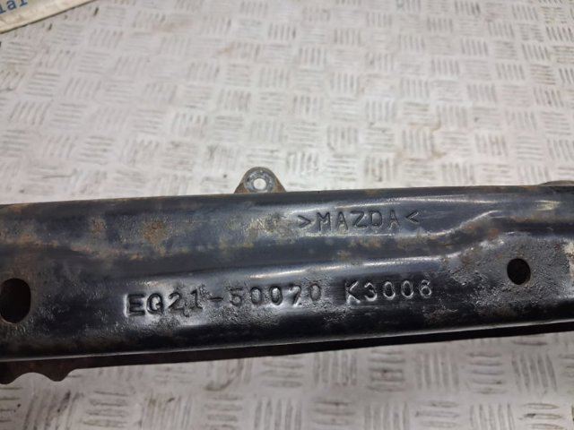 Підсилювач бампера переднього EG2150070A MAZDA